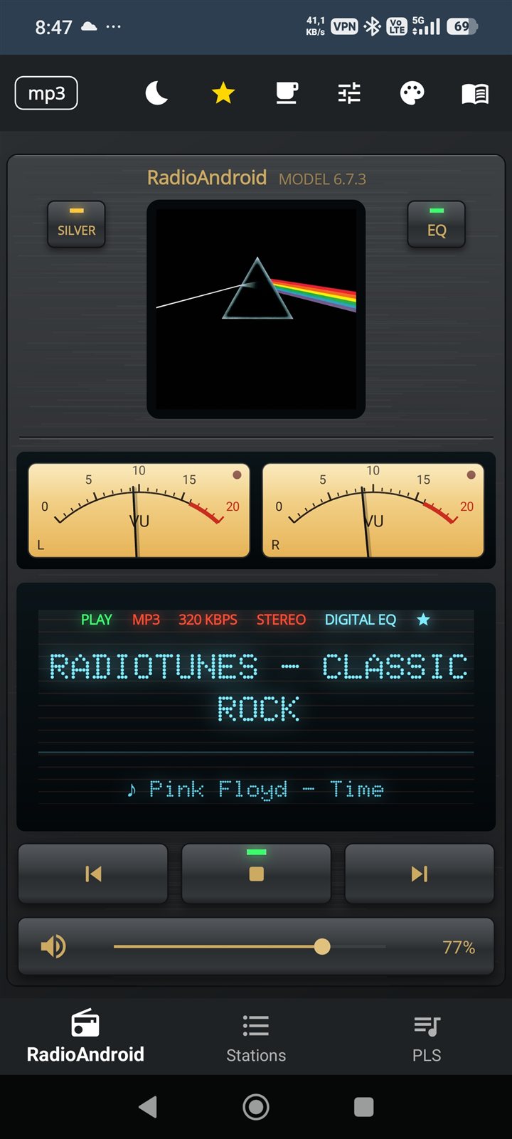Vintage player style, black, with the two needle VU meters moving live